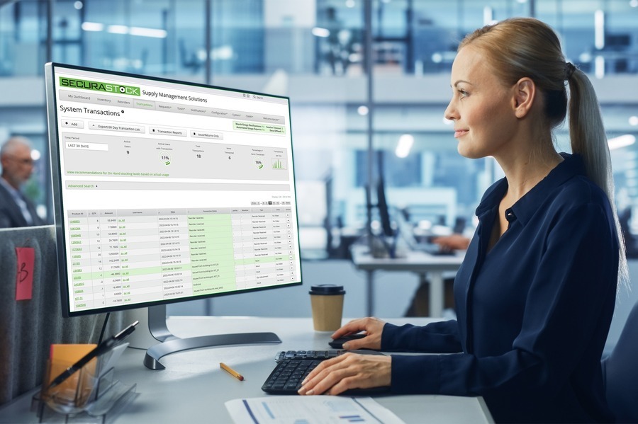 Smiling woman look at monitor showing SS software-1